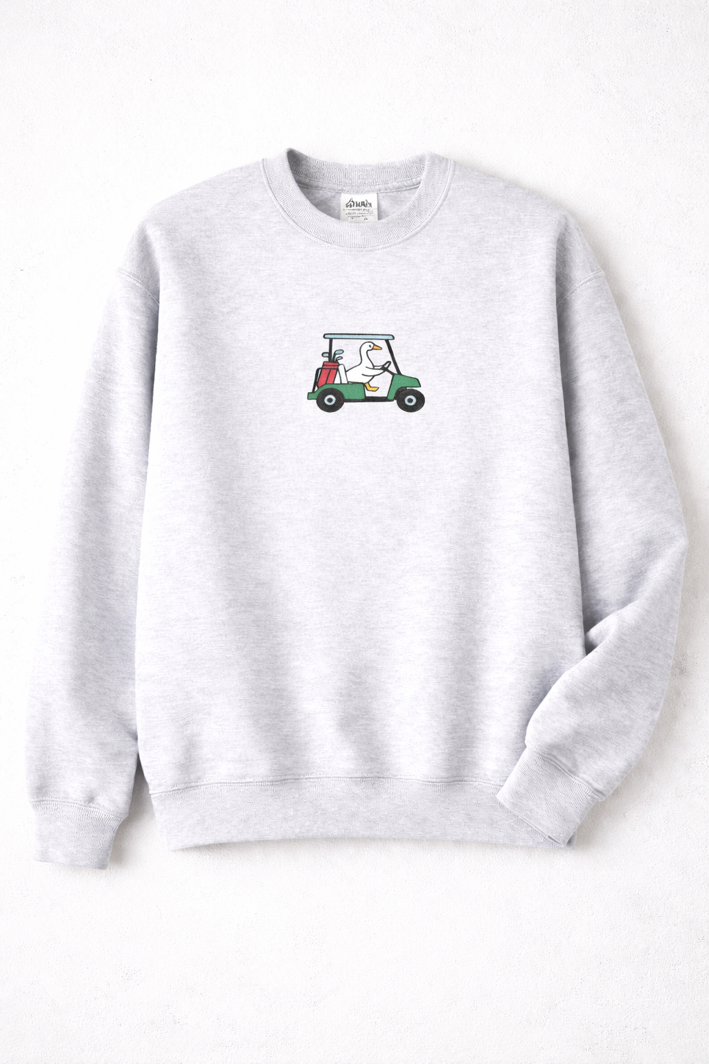 Golf cart driving goose. Customizable made to order, embroidered crewneck.