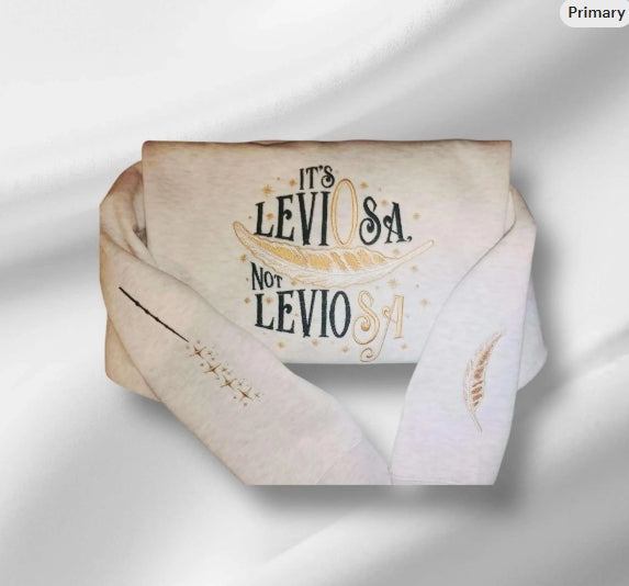 It's LeviOsa not LevioSA, Harry Potter inspired embroidered sweatshirt. Embellished sleeves, wand w/ magic stars on one sleeve and a floating feather on the other.